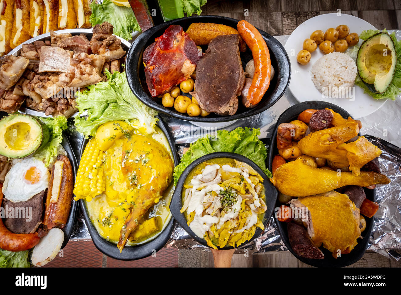 Ajiaco,chicken, sausage, black pudding, pork rinds, avocado, pollo