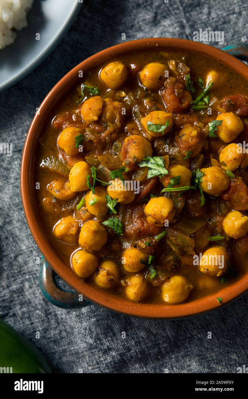 Homemade Indian Chickpea Chana Masala with Rice and Roti Stock Photo ...