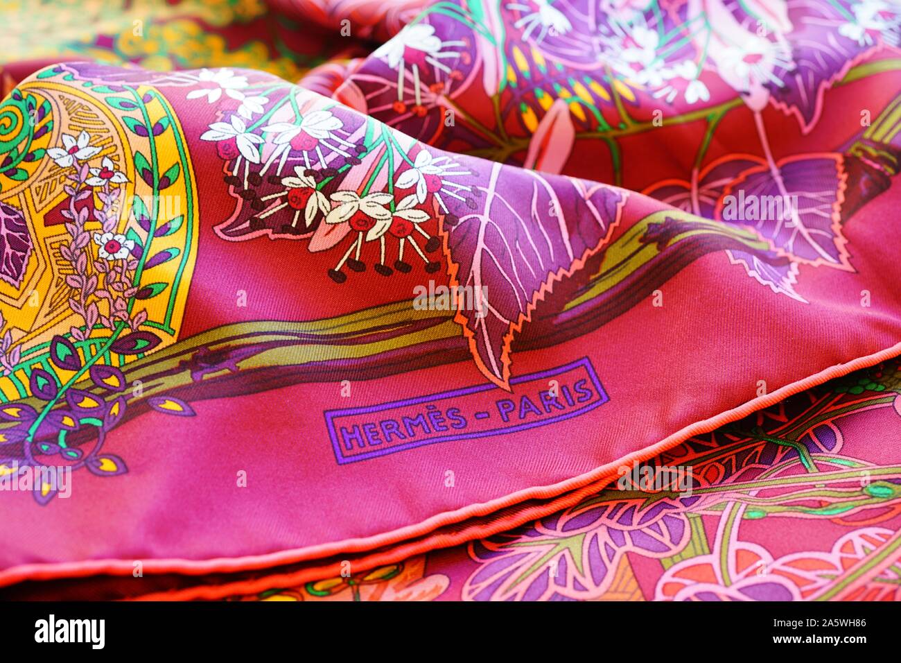 PARIS, FRANCE -21 OCT 2019- View of the Hermes logo name on a colorful  Hermes silk scarf. Hermes is a French leather and clothing brand Stock  Photo - Alamy