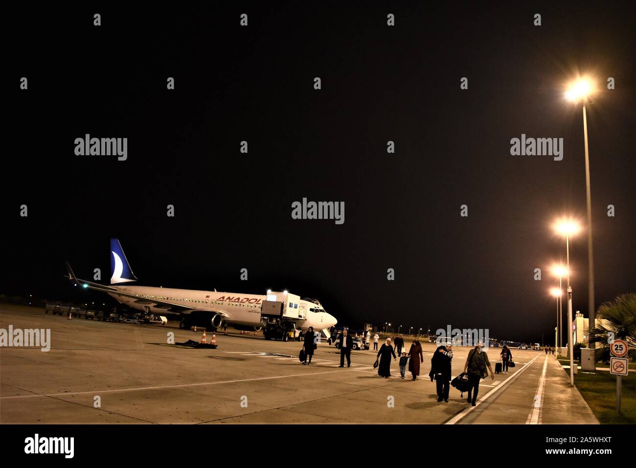 Hatay, Turkey. 23rd Oct, 2019. Passengers disembark from an AnadoluJet aircraft at Hatay Airport. Credit: Altan Gocher/ZUMA Wire/Alamy Live News Stock Photo