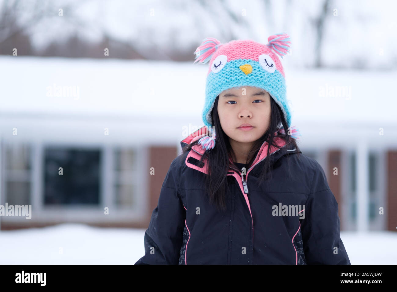 Winter portrait of little child girl wearing knitted hat Stock Photo ...