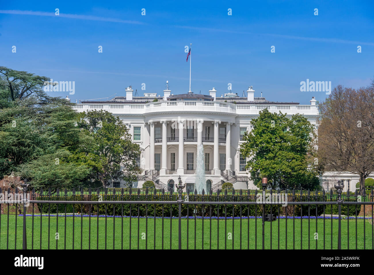 White House with blue sky in Washington DC, USA Stock Photo - Alamy