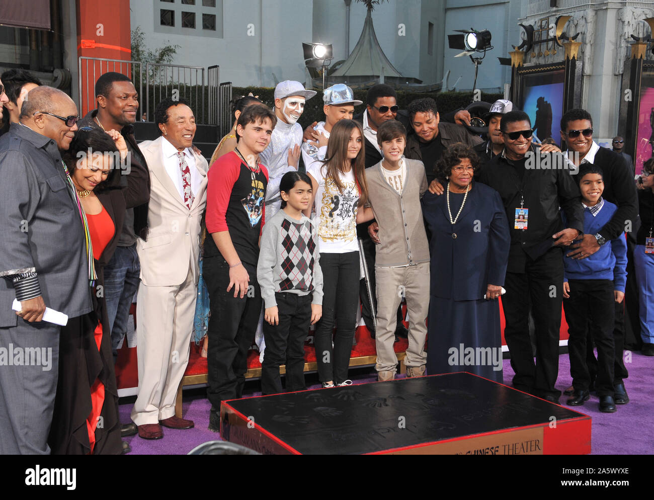 LOS ANGELES, CA. January 26, 2012: Michael Jackson's children Prince Michael, Paris & Prince Michael II 'Blanket' with their grandmother Katherine Jackson & singer Justin Bieber, Smikey Robinson, Quincy Jones & Tito Jackson on Hollywood Boulevard where they placed their father's hand & footprints, using his shoes & glove, in cement in the courtyard of the Grauman's Chinese Theatre. Cirque du Soleil's new show 'Michael Jackson THE IMMORTAL World Tour' premieres in Los Angeles tomorrow. © 2012 Paul Smith / Featureflash Stock Photo