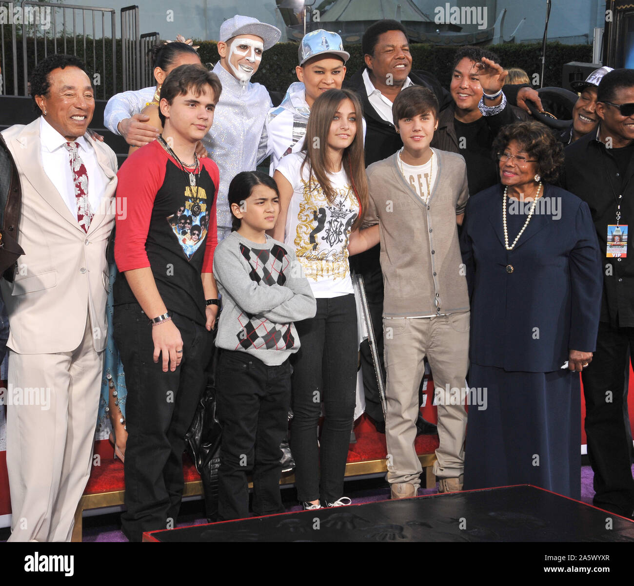 LOS ANGELES, CA. January 26, 2012: Michael Jackson's children Prince Michael, Paris & Prince Michael II 'Blanket' with their grandmother Katherine Jackson & singer Justin Bieber, Smikey Robinson, Quincy Jones & Tito Jackson on Hollywood Boulevard where they placed their father's hand & footprints, using his shoes & glove, in cement in the courtyard of the Grauman's Chinese Theatre. Cirque du Soleil's new show 'Michael Jackson THE IMMORTAL World Tour' premieres in Los Angeles tomorrow. © 2012 Paul Smith / Featureflash Stock Photo