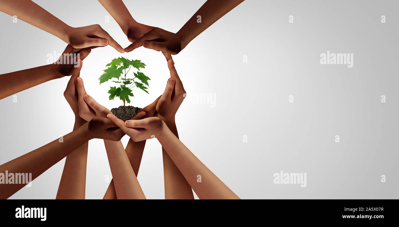 Earth day and earthday as group of diverse people joining to form heart hands connected together protecting the environment and conservation. Stock Photo