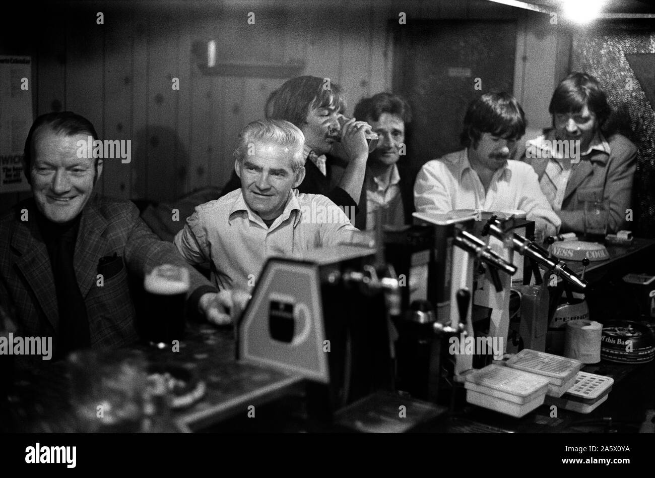 Derry Northern Ireland Londonderry. 1979. Catholic men lunch time drinkers in the Sports Bar Derry town centre. 1970s HOMER SYKES Stock Photo