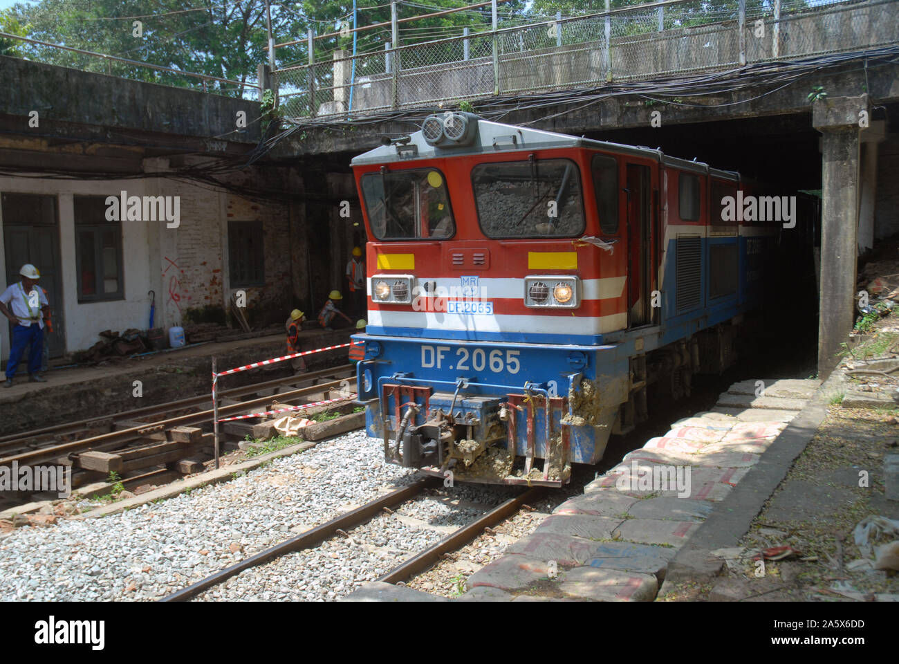 Old British train arriving at Phaya Lan Train Station station, Yangoon
