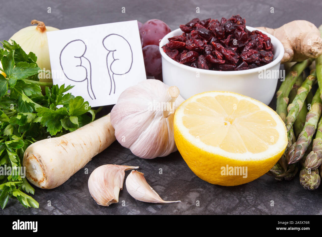 Drawing of kidneys and fresh healthy eating containing natural vitamins