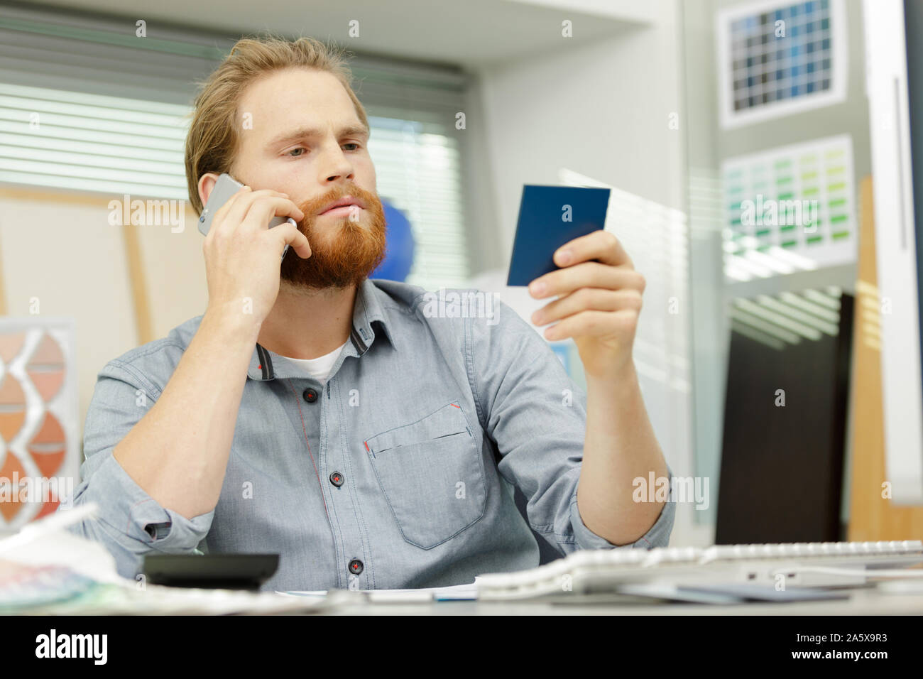 painter trying to match colors for painting job Stock Photo Alamy