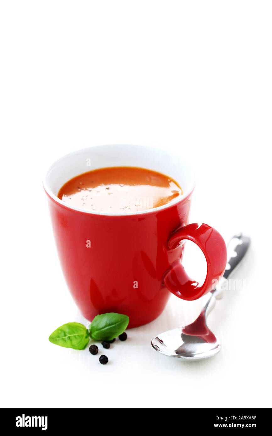 Tomato Soup In A Red Cup Isolated On White Stock Photo - Alamy