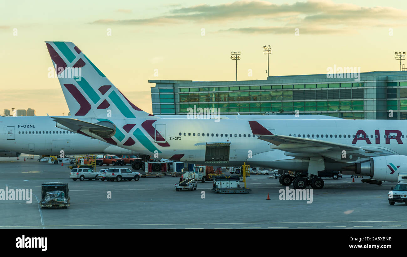 Air Italy, Airbus A330-2 (EI-GFX) on new livery / logo while parked at a gate at Toronto Pearson Intl. Airport. Stock Photo