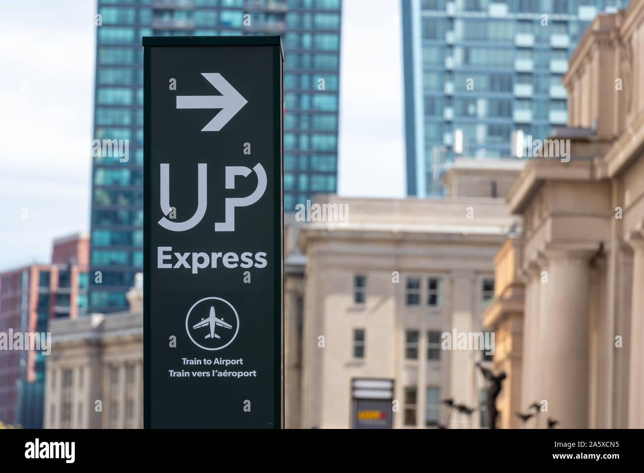 Union Pearson (UP) Express "Train To Airport" directional sign out front of Union Station Toronto. Stock Photo