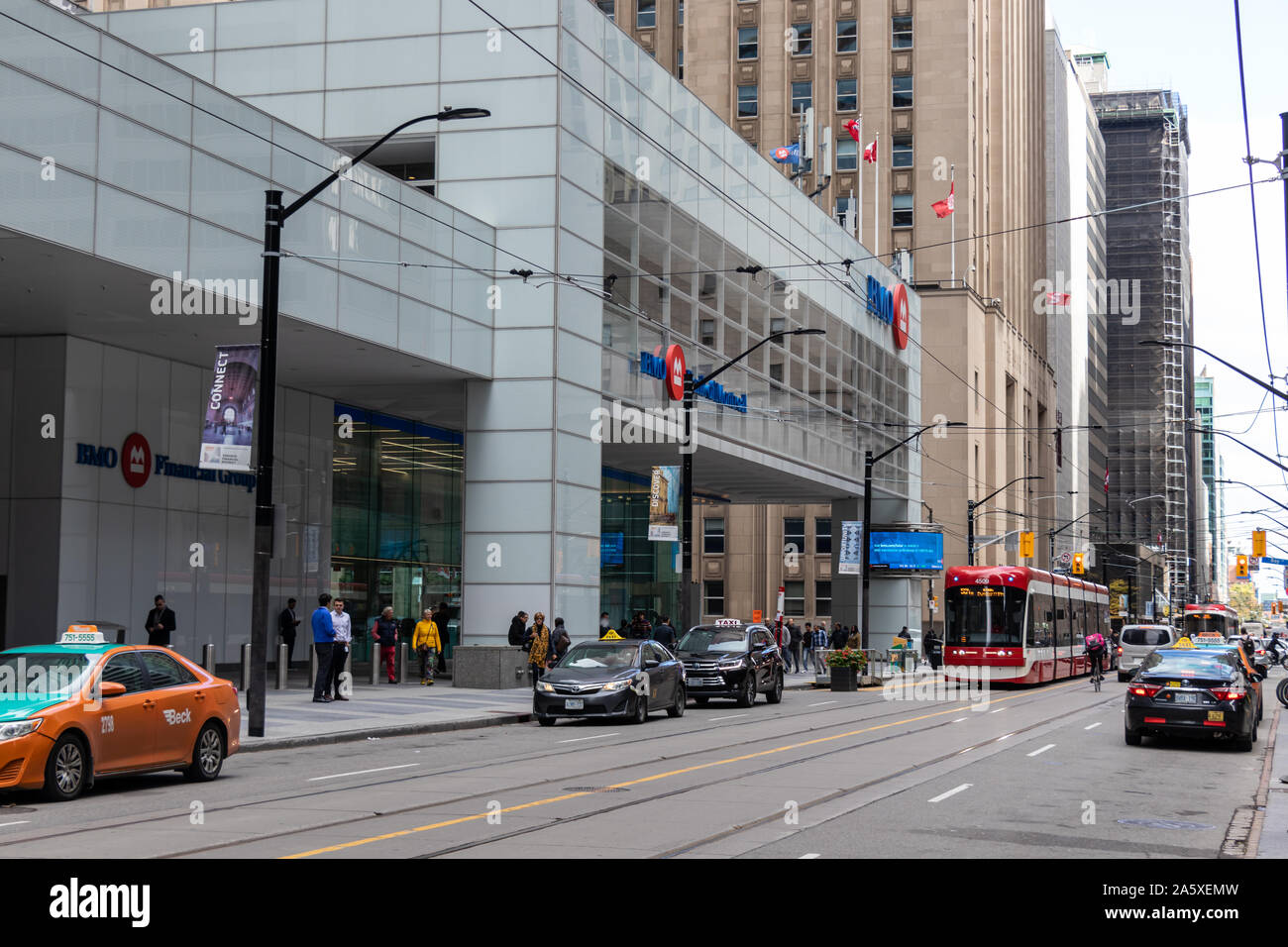 Busy King Street at the base of First Canadian Place where BMO's main branch in downtown Toronto is located. Stock Photo