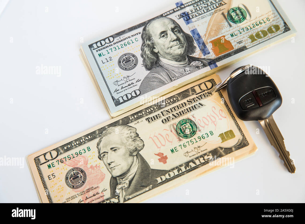 Currency and car keys on the table Stock Photo Alamy