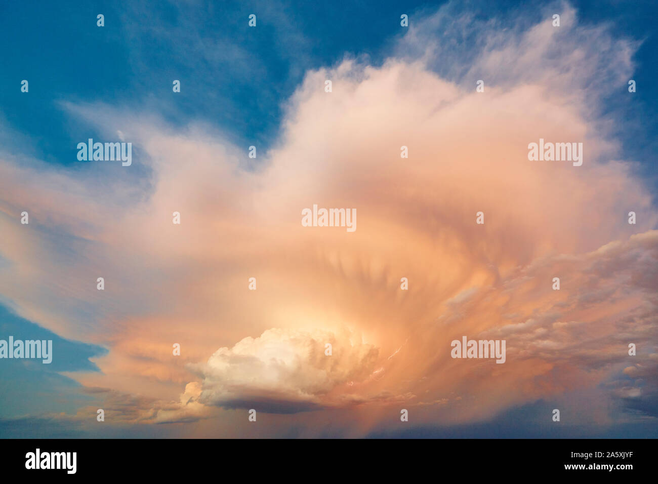 Cloudy stormy dramatic sky with lightning strike. Thunder cloudscape. Meteorology Stock Photo