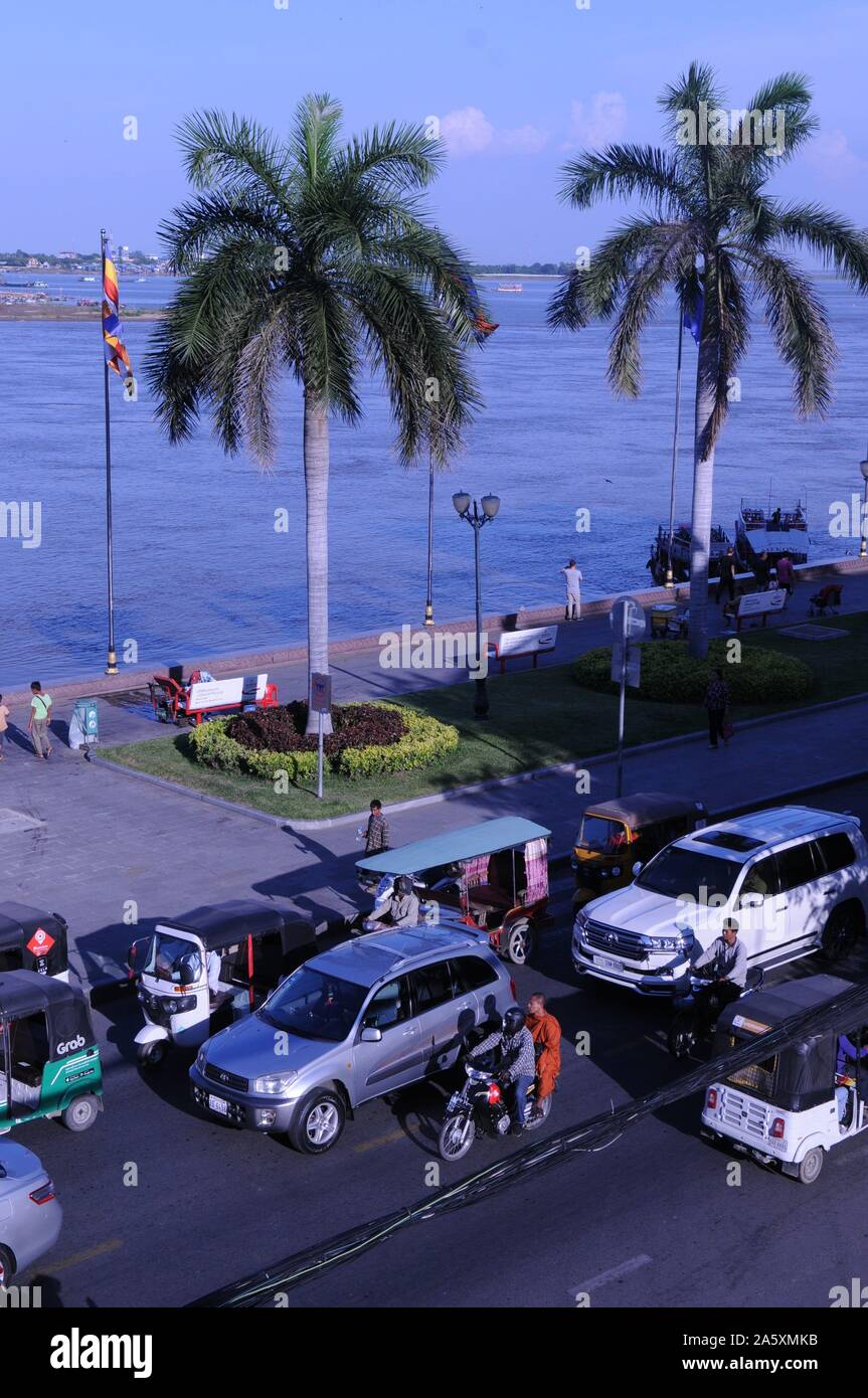 Traffic on Sisowath Quay Boulevard, near the confluence of The Mekong River & The Tonle Sap River. the riverside, Phnom Penh, Cambodia. © Kraig Lieb Stock Photo