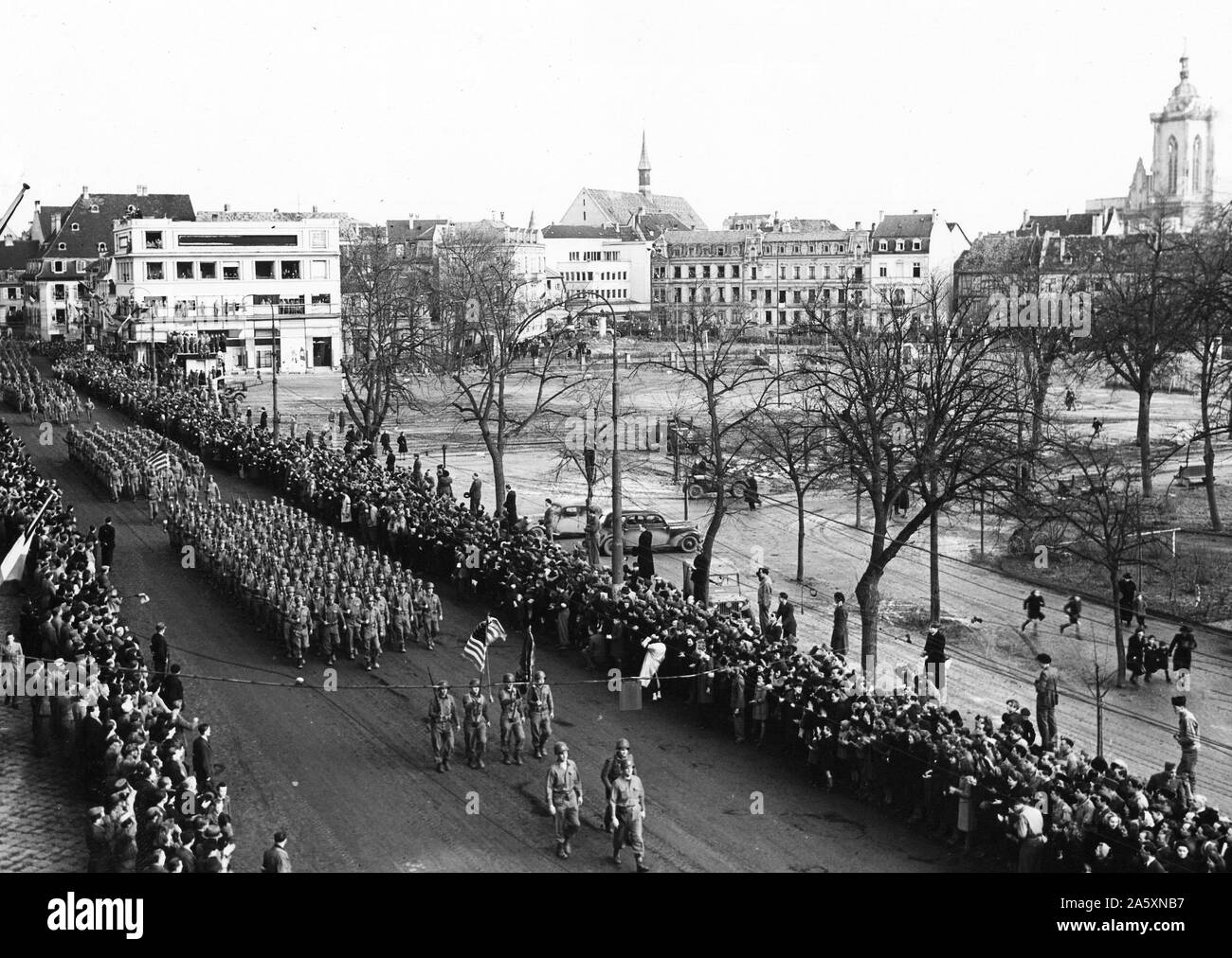 28th Infantry Division leads the color guard at the Colmar Victory Parade. 2/8/45. Stock Photo