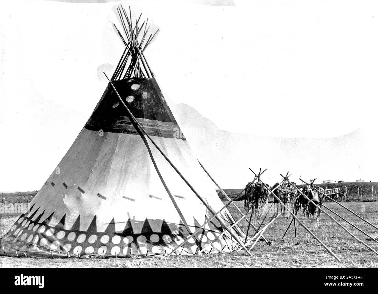 Edward S. Curits Native American Indians - Tepee on the plains of Alberta, Canada ca. 1927 Stock Photo