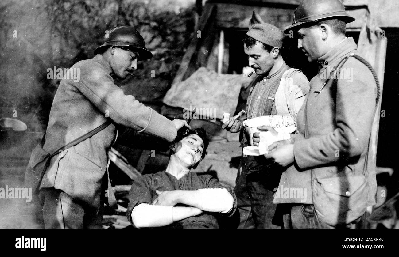 French soldier volunteers to shave a Yank near the front, France ca ...