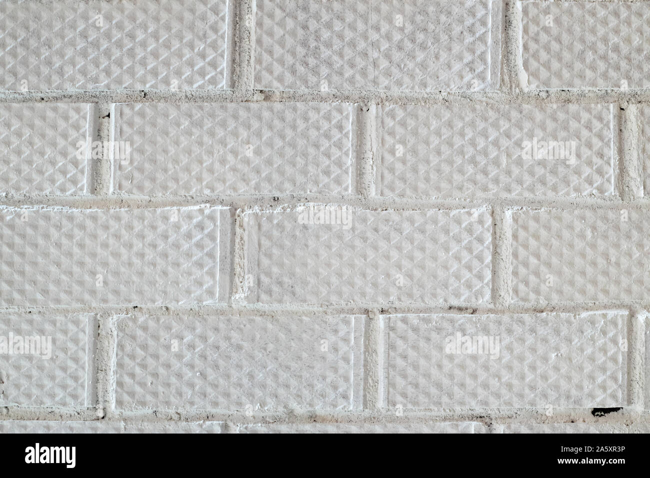Background of white brick wall pattern texture Stock Photo - Alamy