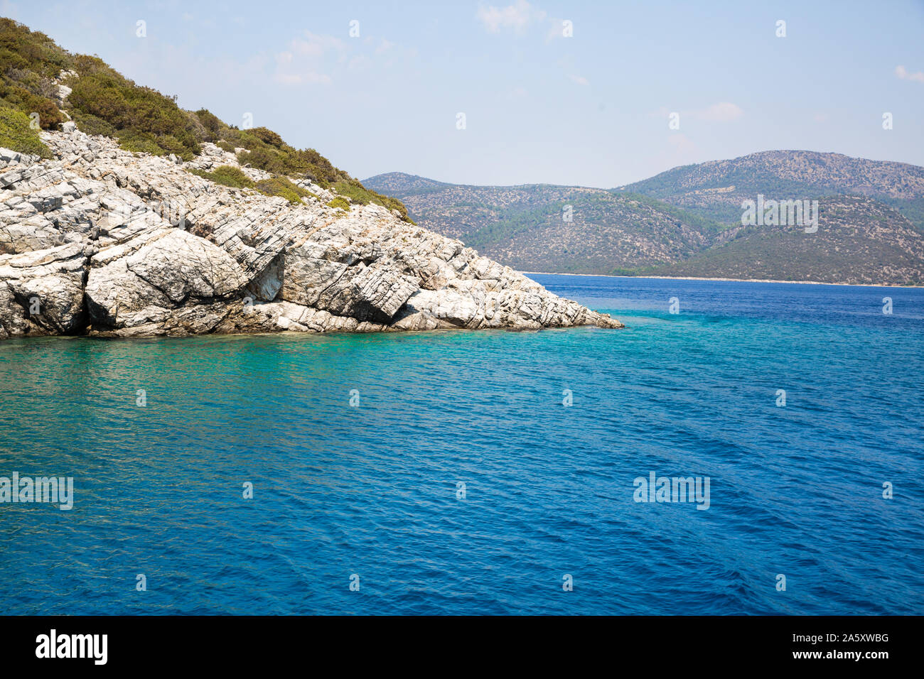 Blue turquoise water of mediterranean sea (aegean sea). Turkey, Bodrum region. Stock Photo