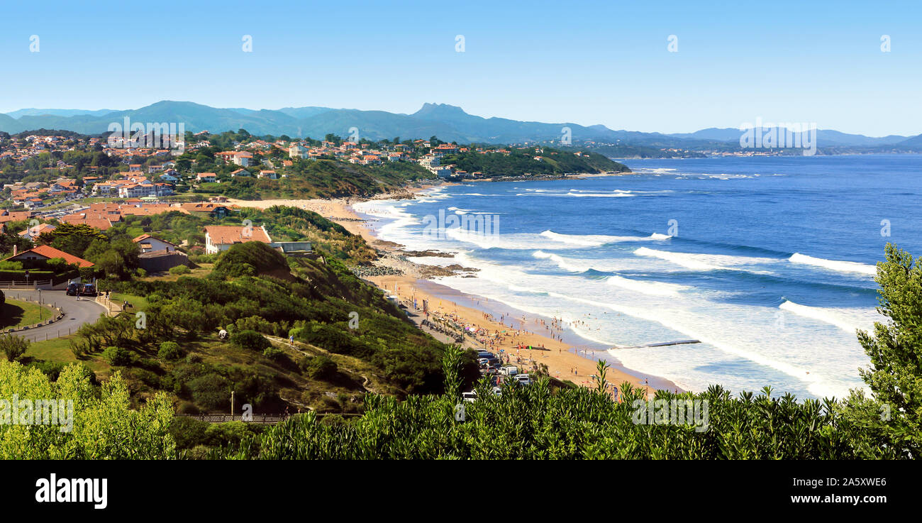 The beach and the waves of the ocean on the Basque coast . Stock Photo