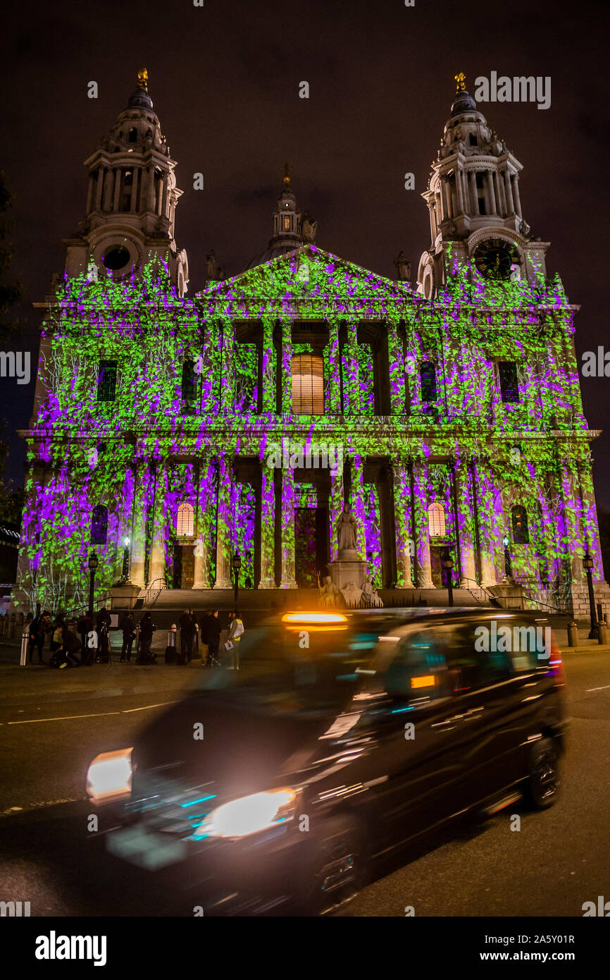London, UK. 23rd Oct, 2019. An Historic England installation Where Light Falls, an illuminations event at St Paul's Cathedral this autumn. The light show celebrates the Second World War's everyday heroes who risked their lives to protect the places they loved, tying into the 80th anniversary commemorations this year. Projections from Double Take Projections with new poetry by London-based poet Keith Jarrett illuminate the building and tell the story of the St Paul's Watch who ensured the survival of the cathedral during the Blitz. Credit: Guy Bell/Alamy Live News Stock Photo