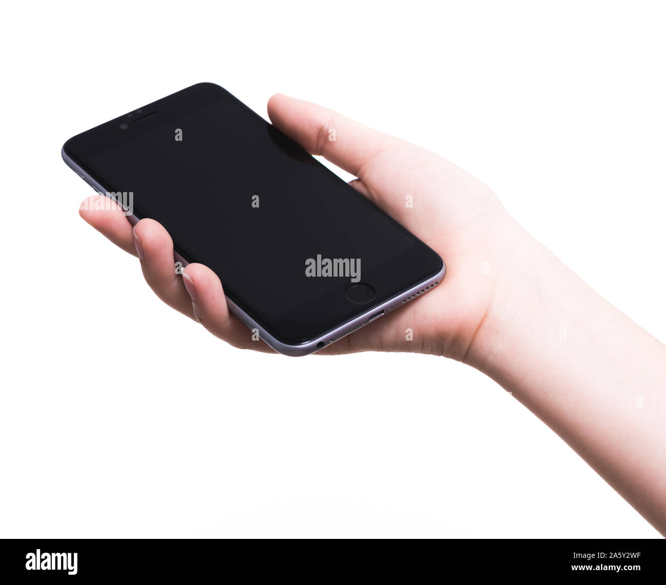 Woman hand holding mobile smartphone blank screen isolated on white ...