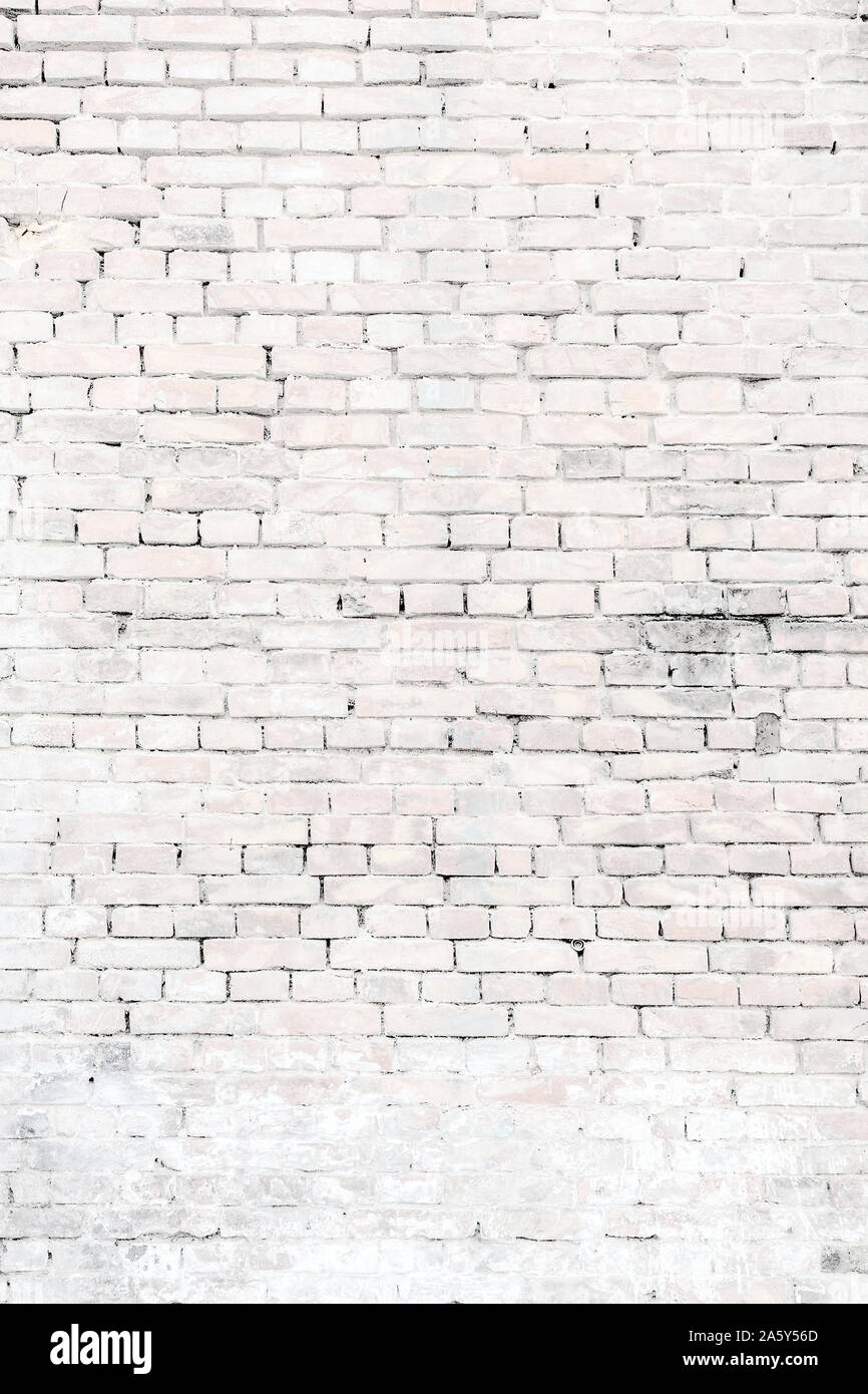 Loft styled white brick wall background Stock Photo