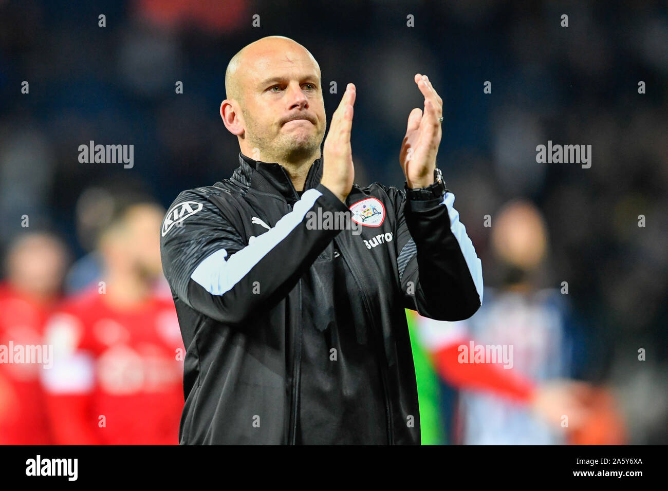 22nd October 2019, The Hawthorns, West Bromwich, England; Sky Bet Championship, West Bromwich Albion v Barnsley : Barnsley Caretaker Head Coach, Adam Murray applauds the travelling supporters after his side drew 2-2 with West Bromwich Albion Credit: Simon Whitehead/News Images Stock Photo