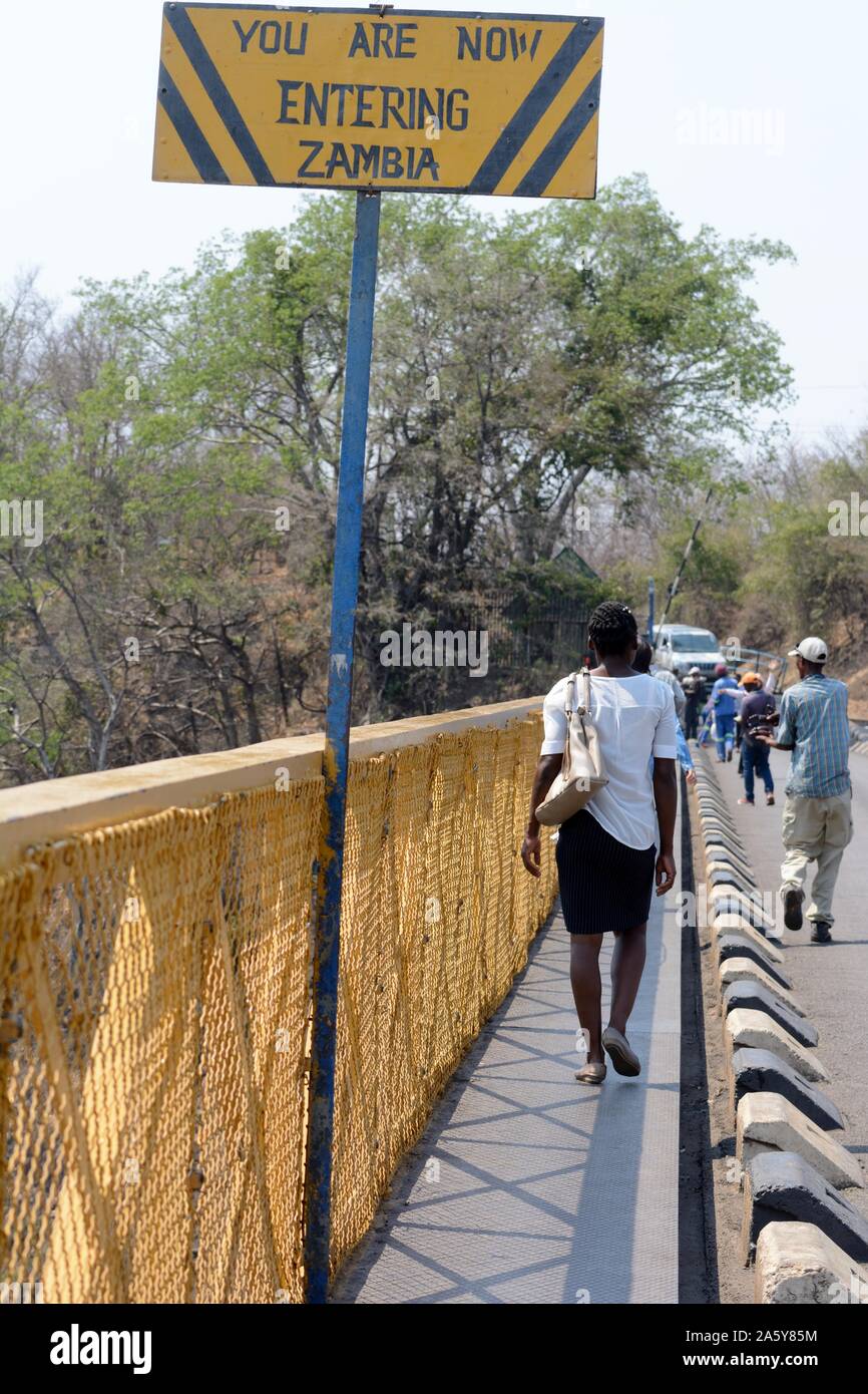 Border crossing between Zambia and Zimbabwe on the Victoria Falls Bridge You are entering Zambia sign Stock Photo