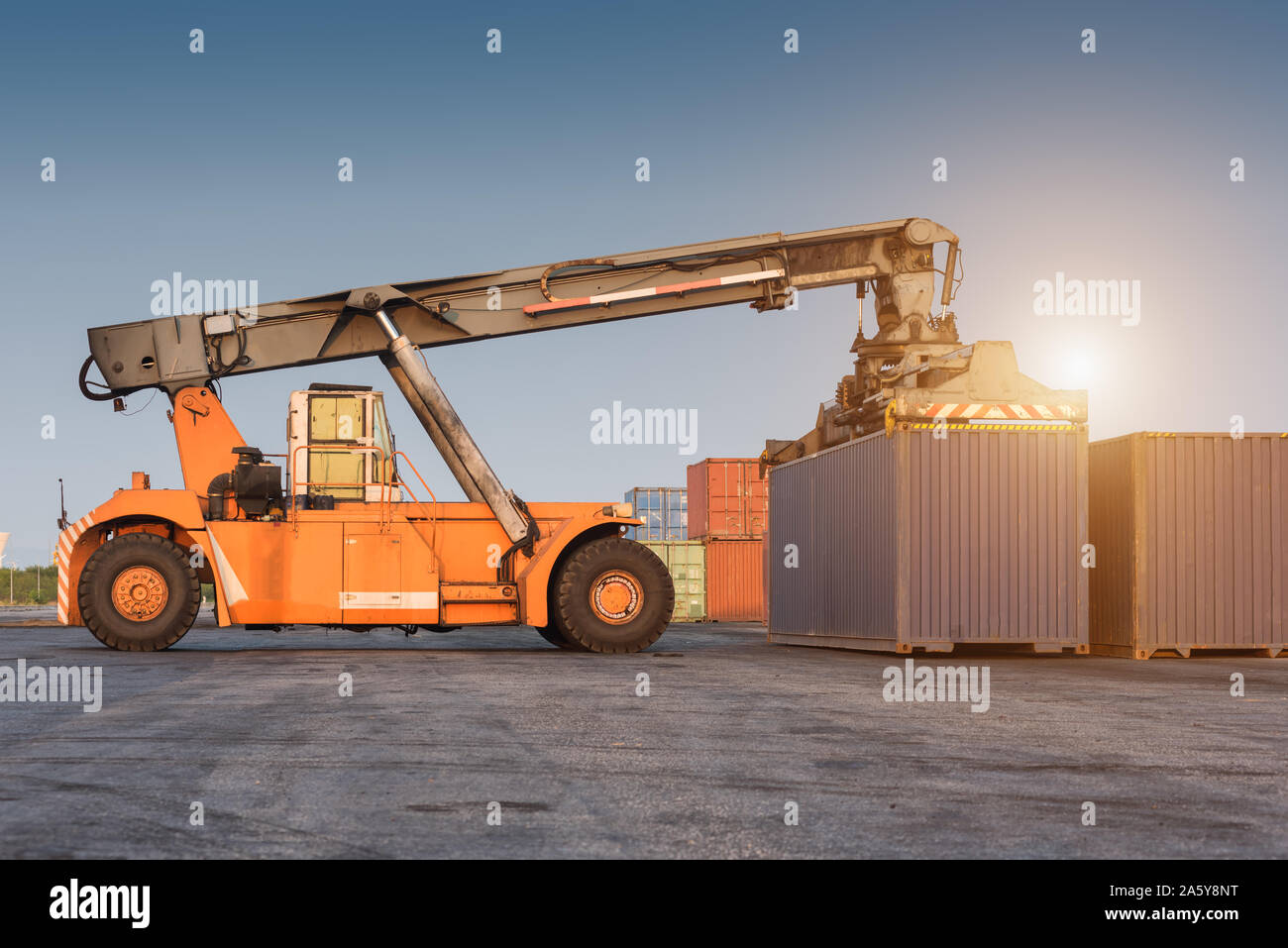 Forklift Handling Holding Container Box At Harbor Logistic Zone Stock Photo Alamy