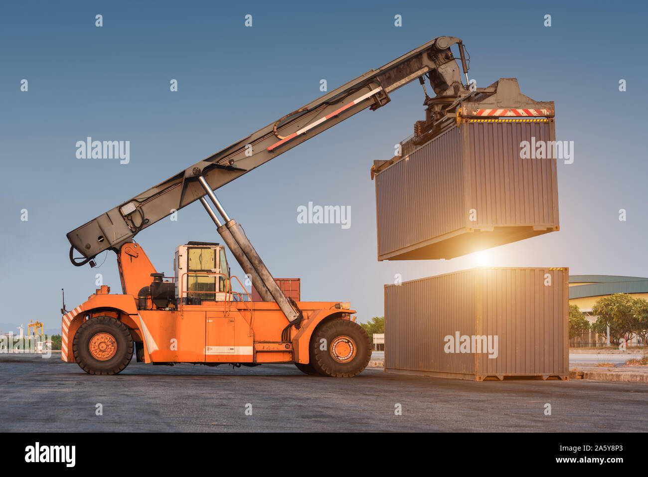 Forklift Handling Holding Container Box At Harbor Logistic Zone Stock Photo Alamy