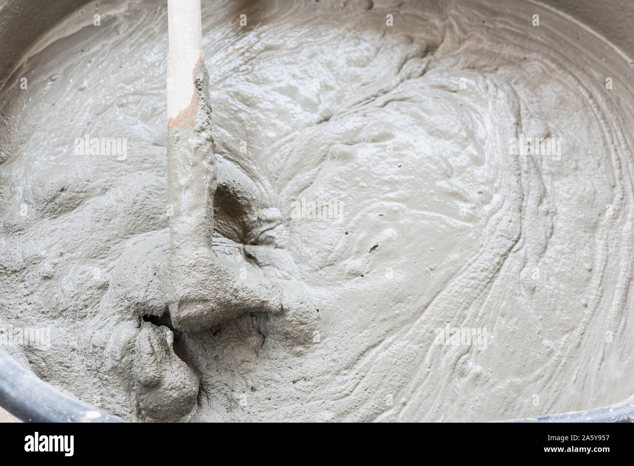 cement mix concrete is compacted sand by spade for construction Stock Photo Alamy