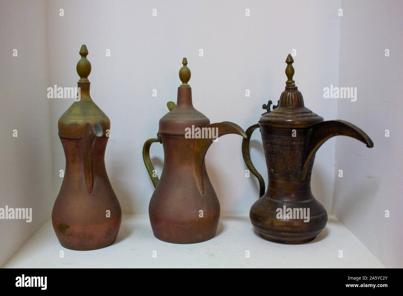 Arab traditional old antique items. Brass coffee pot,cups,plates and trays. Stock Photo