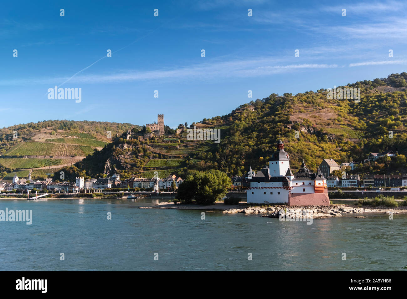 View of Pfalzgrafenstein Castle, known as the Pfalz, a famous toll castle on the Falkenau island and Gutenfels castle on the bank of the Rhine river. Stock Photo
