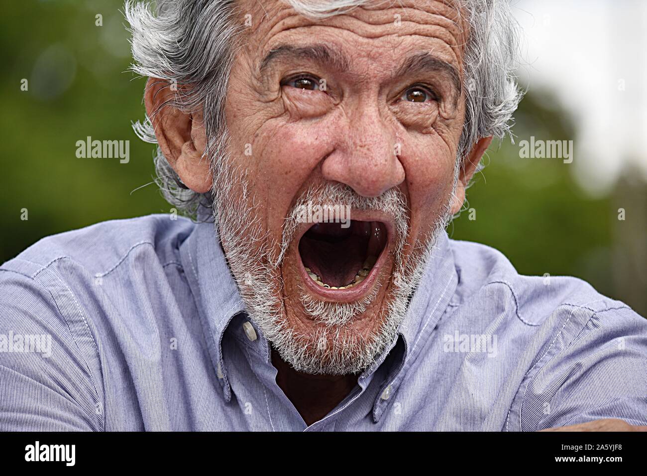 Stressed Male Grandpa Stock Photo