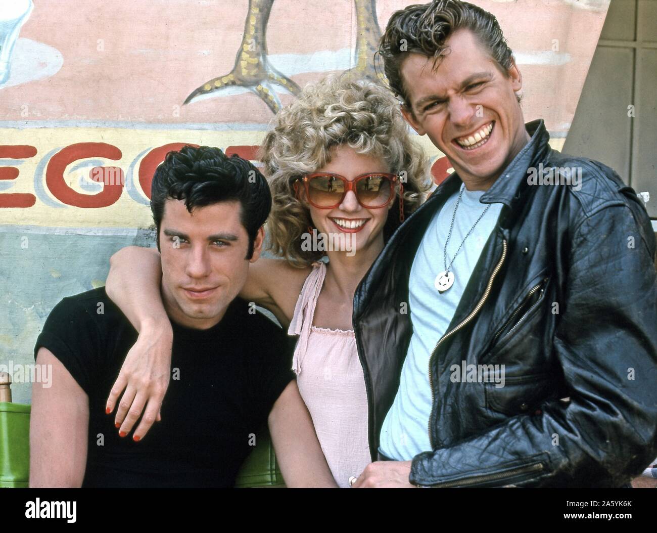 Grease Year : 1978 USA Director : Randal Kleiser John Travolta, Olivia Newton-John, Jeff Conaway on the set Stock Photo