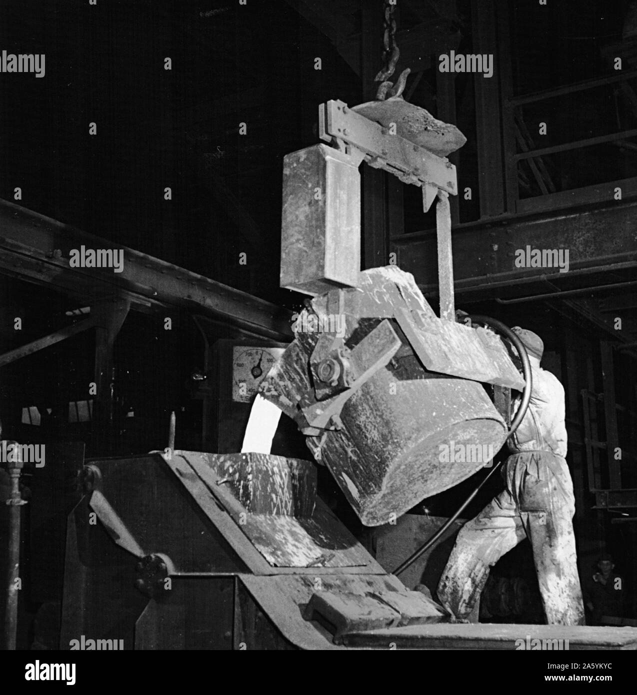 European Recovery Act, known as The Marshall Plan, the United States' programme for the rebuilding of Europe after World War II and to stop the spread of Communism. Beginning in 1947, the plan lasted for four years.  Pouring molten steel from a ladle: Roy Stock Photo