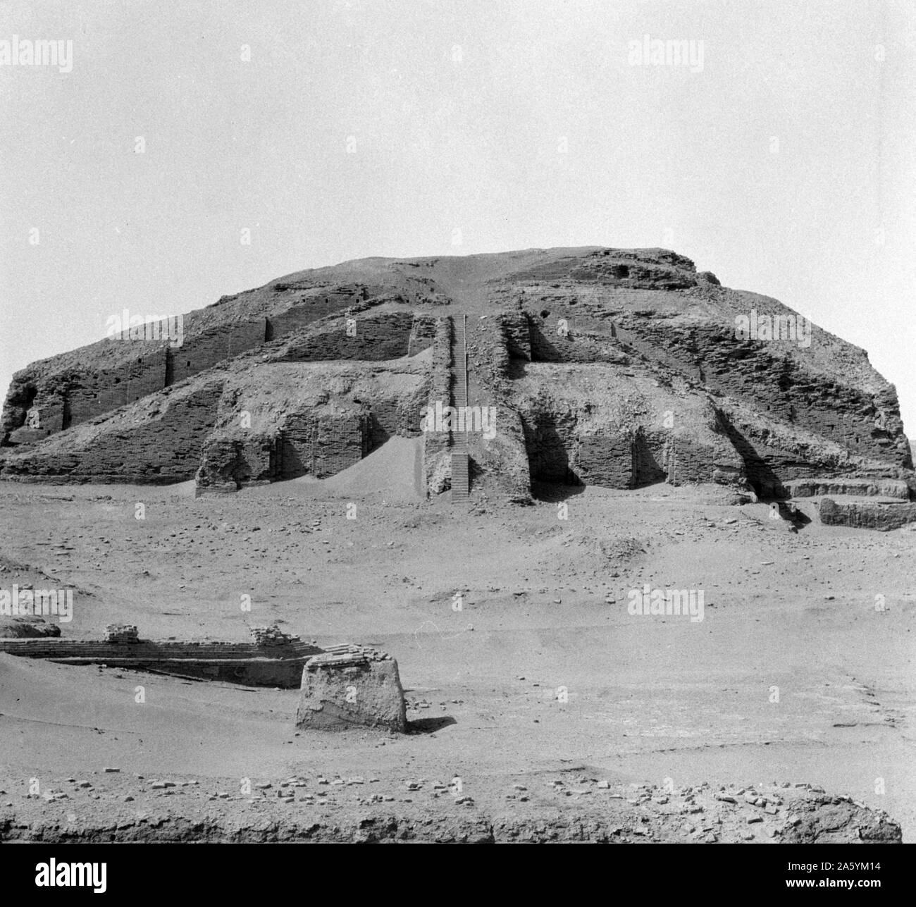 The Great Ziggurat of Ur, near Nasiriya, Iraq. Ziggurats were built by the Sumerians, Babylonians, Elamites, Acadians, and Assyrians for local religions. Each ziggurat was part of a temple complex which included other buildings. The precursors of the ziggurat were raised platforms that date from the Ubaid period[1] during the fourth millennium BC. The earliest ziggurats began near the end of the Early Dynastic Period.[2] The latest Mesopotamian ziggurats date from the 6th century BC. Stock Photo