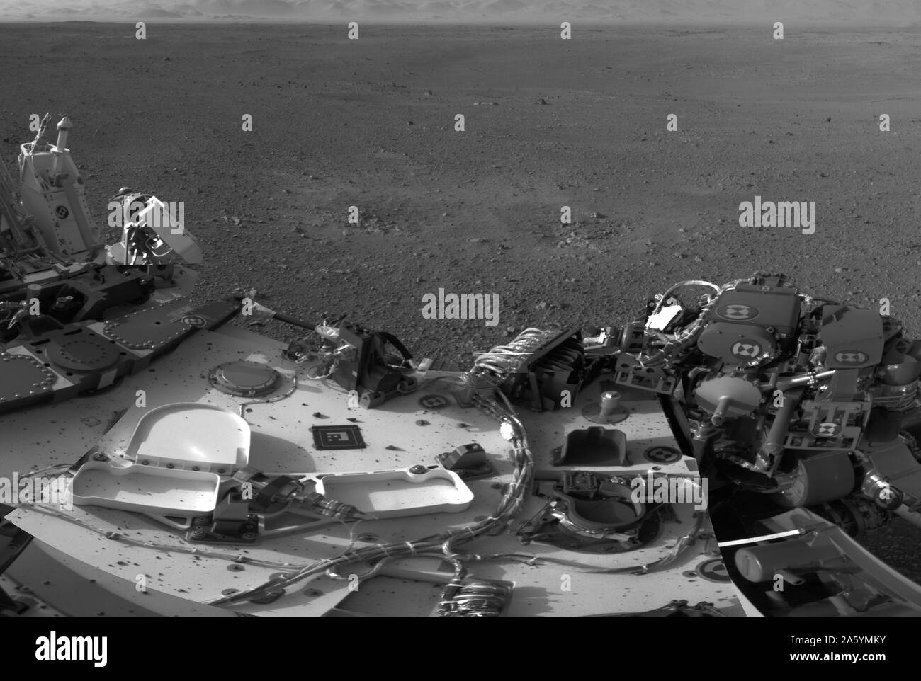 The image shows part of the deck of NASA's Curiosity rover taken from one of the rover's Navigation cameras looking toward the back left of the rover. Stock Photo