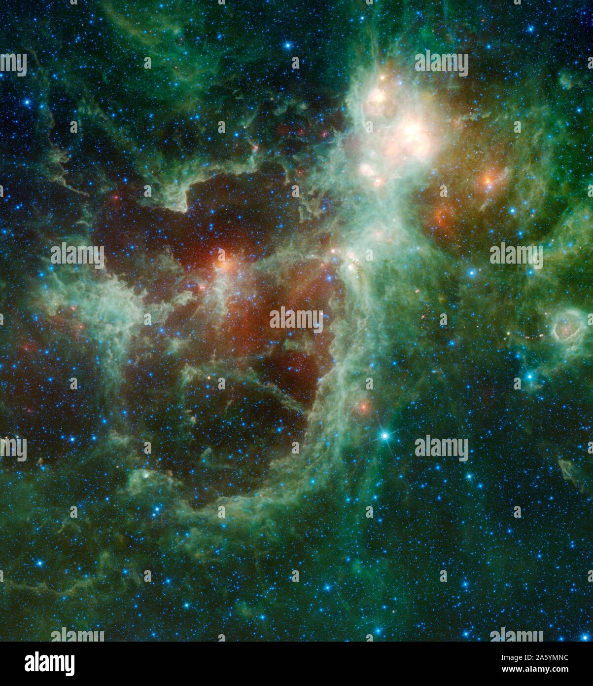 The Heart and Soul nebulae are seen in this infrared mosaic from NASA's WISE. Located in the constellation Cassiopeia, about 6,000 light-years from Earth, the Heart and Soul nebulae form a vast star-forming complex that makes up part of the Perseus spiral arm of our Milky Way galaxy. The nebula to the right is the Heart, and to the left is the Soul nebula. Stock Photo