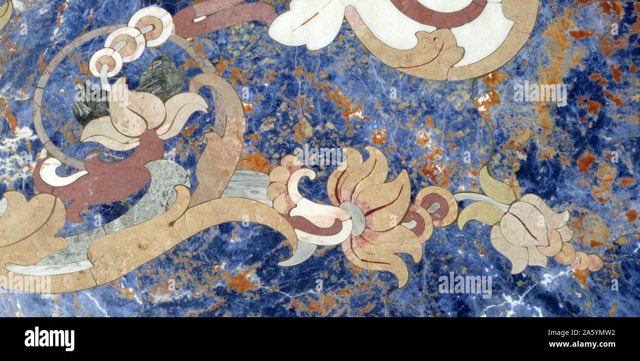 Detail from a 19th century marble table from Italy. Using colourful floral inlays to create the design. Stock Photo