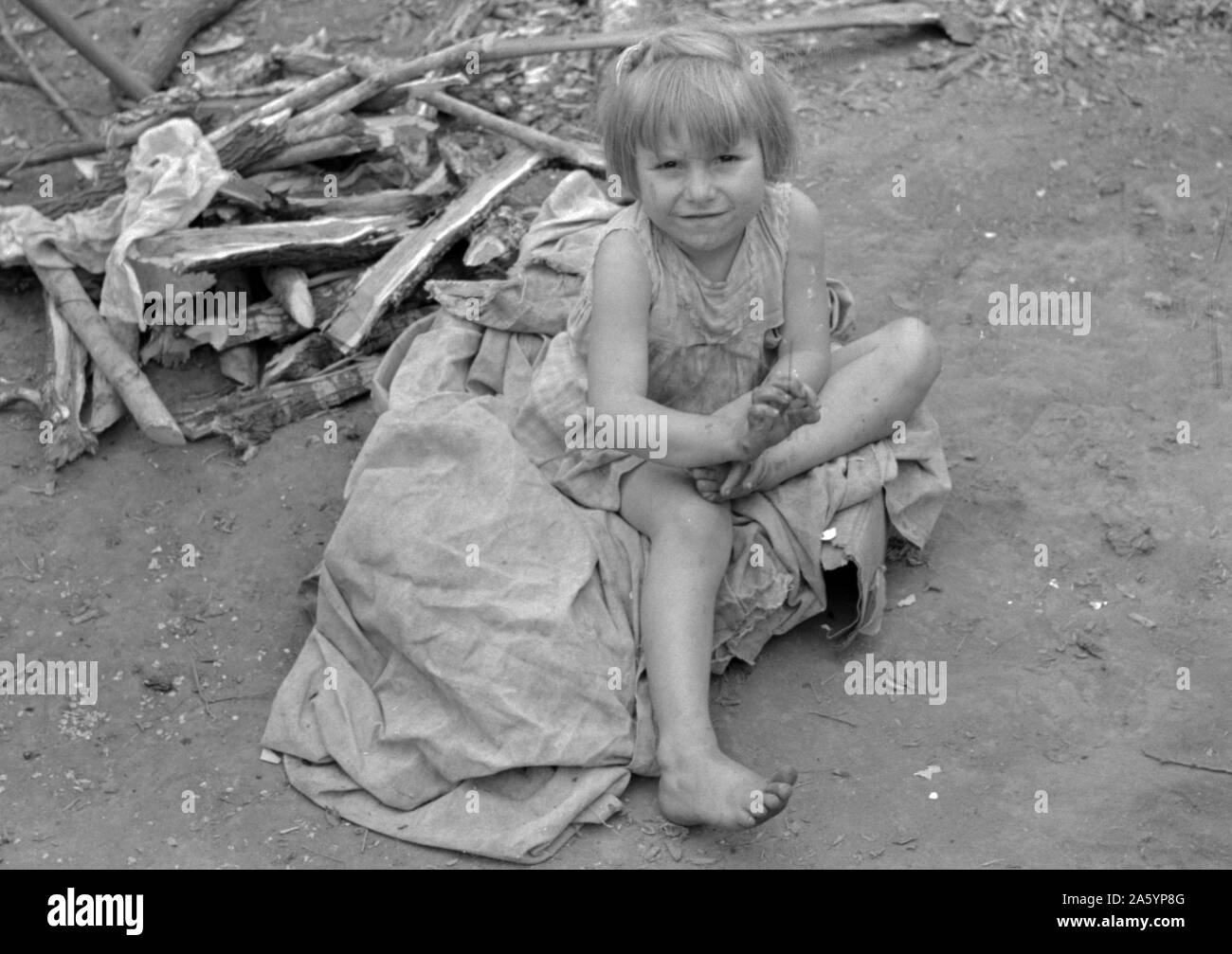 Child of migrant worker near Harlingen, Texas by Russell Lee, 1903-1986, dated 19390101. Stock Photo