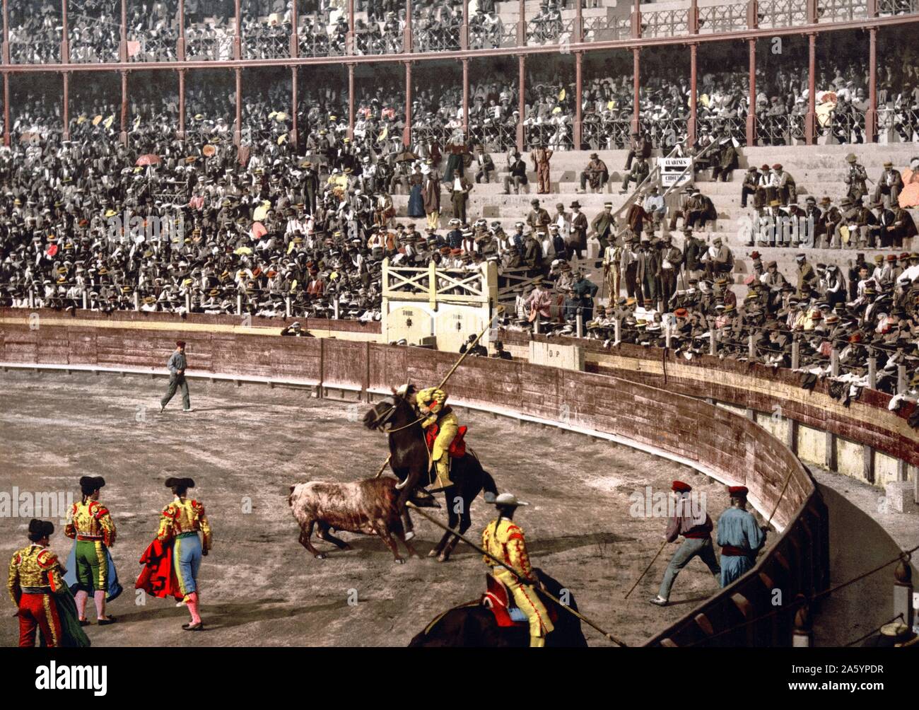 Hand-Coloured photograph of bullfighting in Barcelona, Spain. Dated 1890 Stock Photo