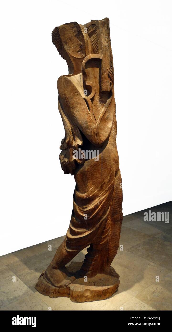 Elm wood sculpture titled 'Orpheus' by Ossip Zadkine (1890-1967) a French sculptor, but also produced paintings and lithographs. Dated 1930 Stock Photo