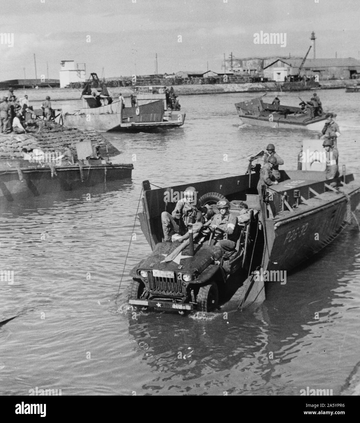 Fedala, Morocco. Jeep rolling off a landing boat at Fedala harbour during the landing operations of the U.S. task forces there. 1942. Stock Photo