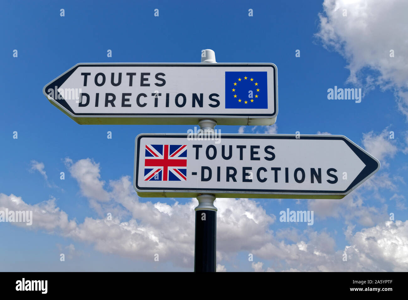 French 'Toutes Directions' double signpost with opposing UK/EU pointers. Stock Photo