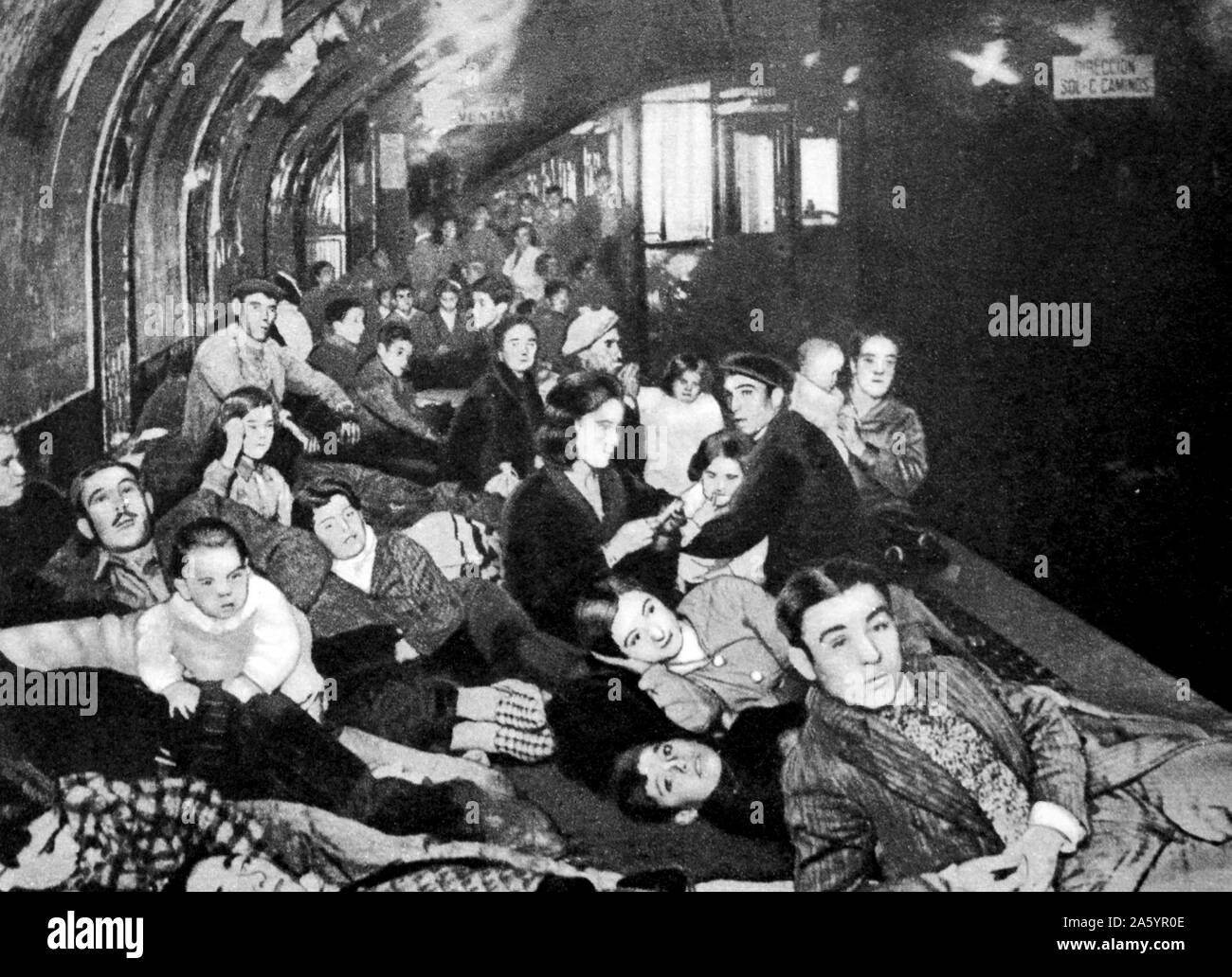 Spanish Civil War: civilians take shelter in a Metro station in Madrid 1938 Stock Photo