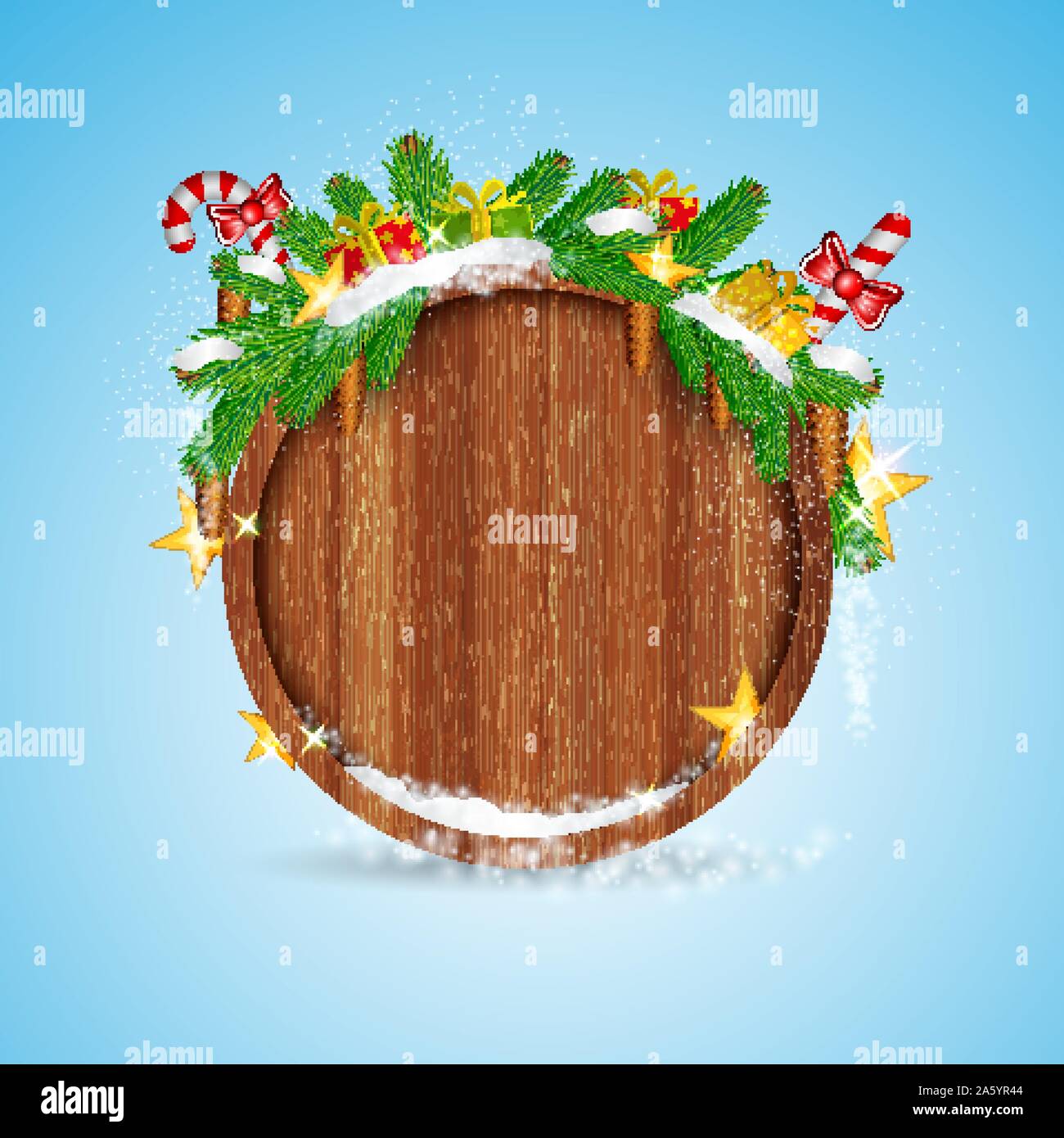 round wood border with snowy fir tree branch cones and presents on blue ...